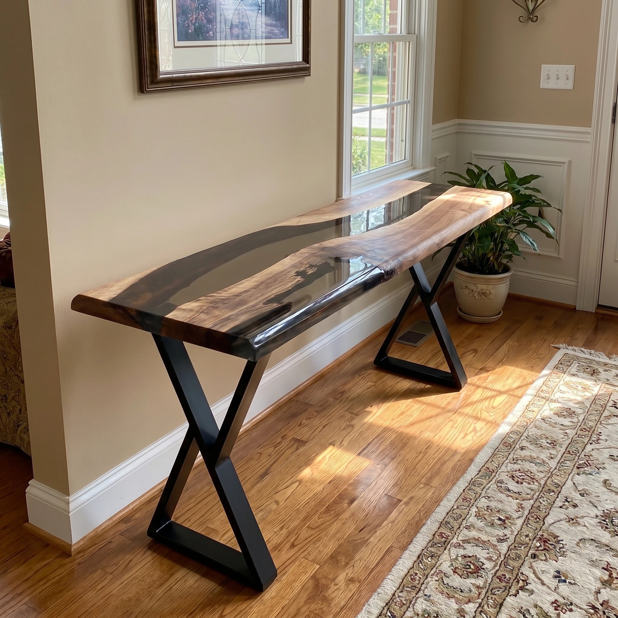 Wooden bench with black metal legs in a room with a window and plant
